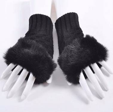 Black finger;ess gloves trimmed with faux fur